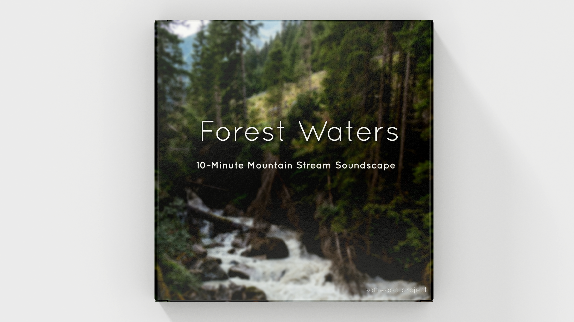 Mountain stream flowing gently through a forest, representing peaceful nature ambience for meditation or sleep