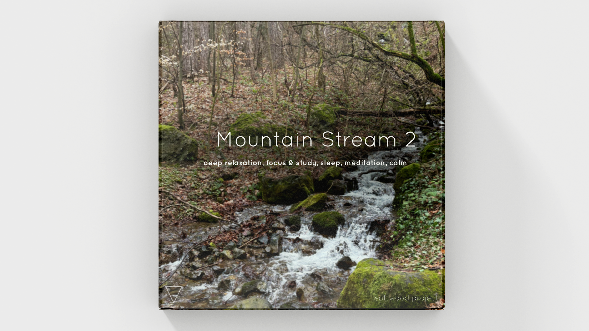 Clear mountain stream flowing over rocks representing a calming 25-minute natural water soundscape for relaxation, sleep, and focus