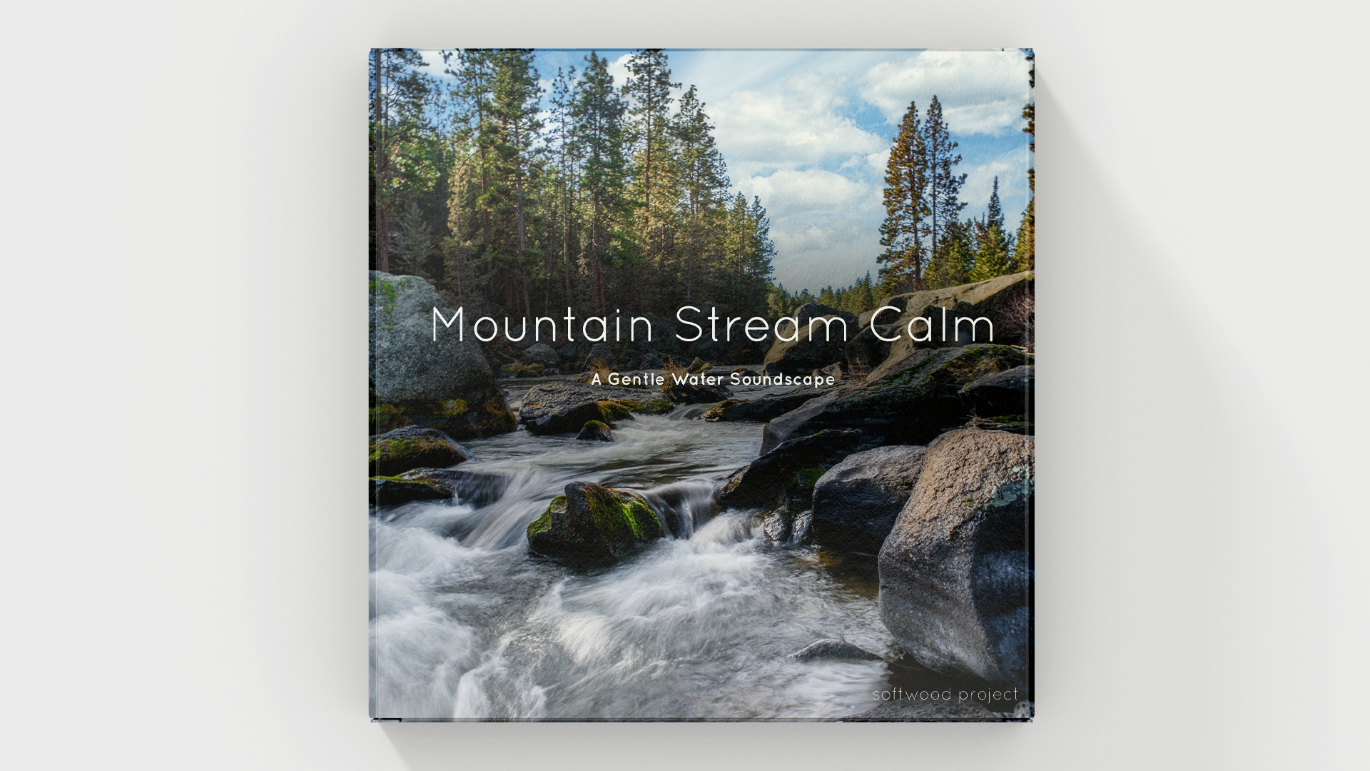 Peaceful mountain stream flowing over stones representing a calming 25-minute water soundscape for relaxation and focus