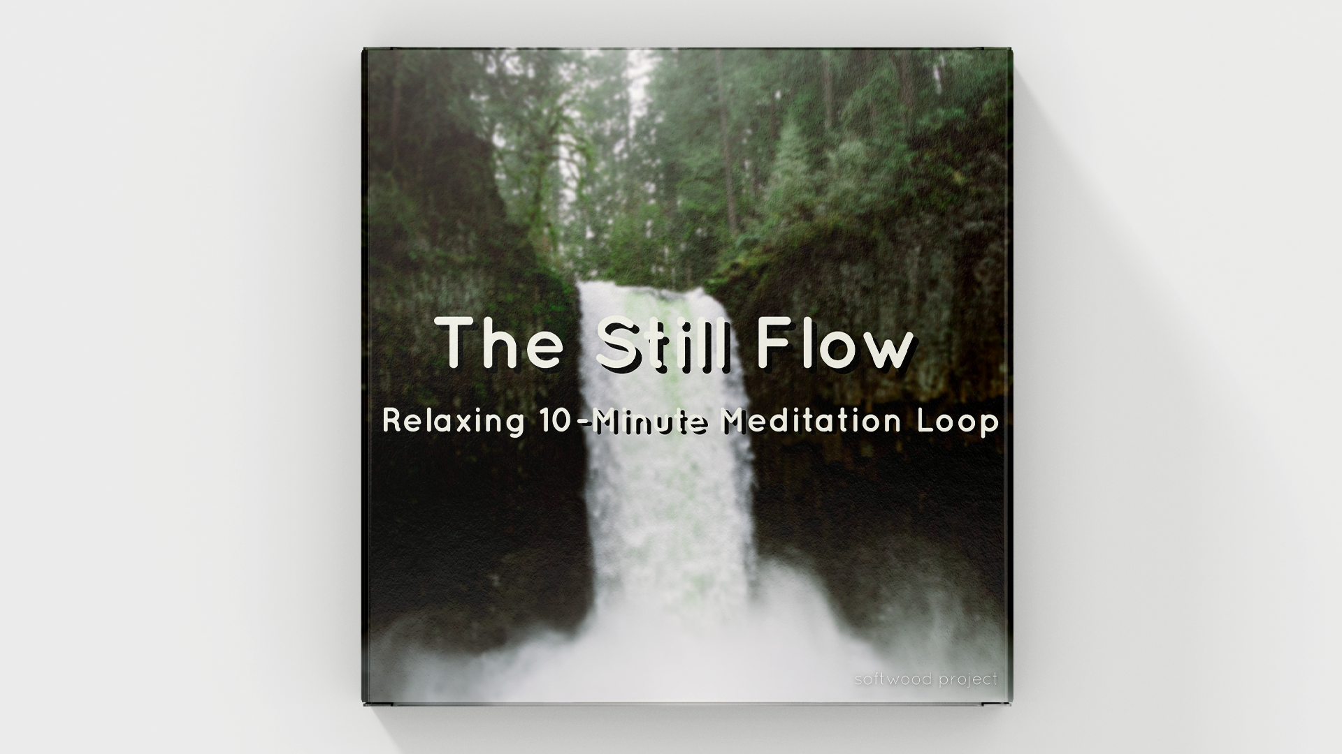 Gentle waterfall surrounded by forest, representing peaceful white noise ambience